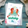 Watercolor seahorses birthday card with underwater background and “Happy Birthday” text