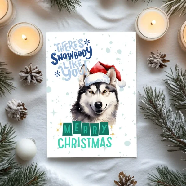 Printable Siberian Husky Christmas card with red Santa hat, snowy background, and the message “There’s snowbody like you!”