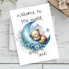 Adorable watercolor card showing a bear on a blue moon, saying, "Welcome to the world, little one!" for new baby celebrations.