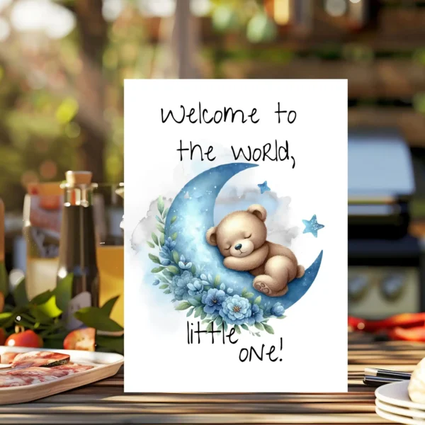 Cute bear on a blue moon in a watercolor design with the text, "Welcome to the world, little one!" for new baby greetings.