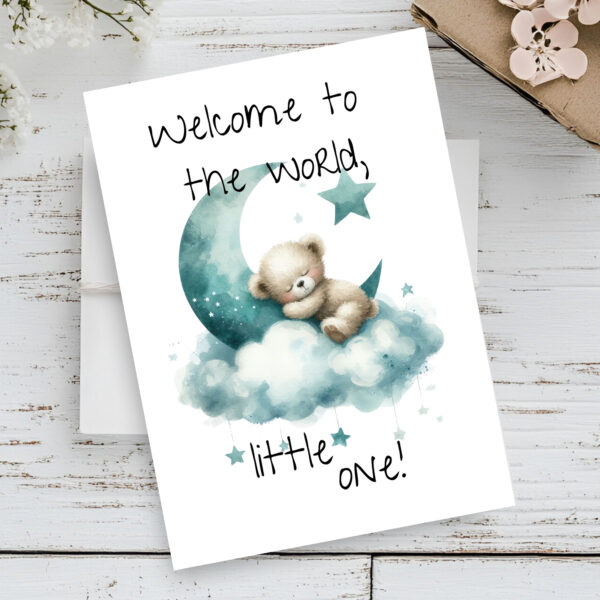 Sweet new baby card with a sleepy bear on a moon in clouds, displaying the message "Welcome to the world, little one!"