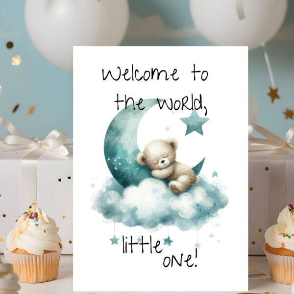 Adorable card with a sleepy bear on a moon, clouds in the background, and the phrase "Welcome to the world, little one!"