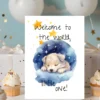 Watercolor card featuring a sleeping puppy on a cloudy bed with stars, saying "Welcome to the world, little one!" for new babies.