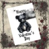 A black bear sits on a marble table in this Gothic Valentine's Day card, offering a quirky and eerie take on love.