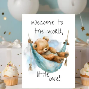 Watercolor card featuring a sleepy teddy bear in a blue hammock with the message, "Welcome to the world, little one!"