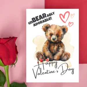 Printable Valentine's Day card showcasing a teddy bear and pink hearts, celebrating love with a cheerful message.