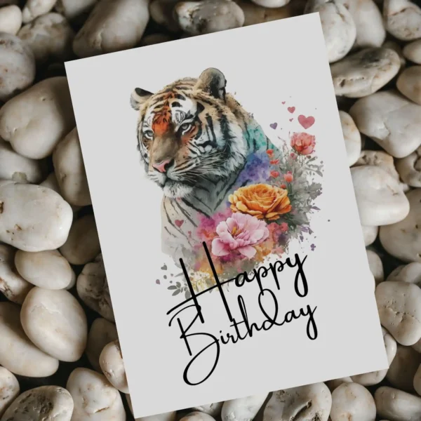 Cheerful tiger birthday card adorned with floral patterns, designed for a joyful birthday celebration.