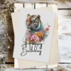 Printable birthday card with a joyful tiger and vibrant floral accents, ideal for celebrating a special day.
