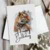 Happy birthday card with a majestic watercolor tiger, ideal for a fun and festive celebration.