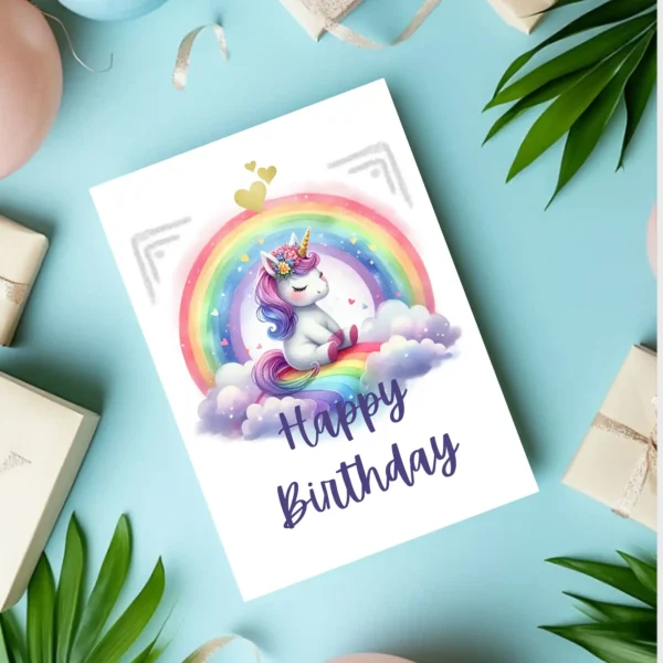 Rainbow-haired unicorn in clouds birthday card
