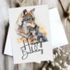 Cheerful watercolor card showing a wolf and pub, celebrating with a "Happy Birthday" message.