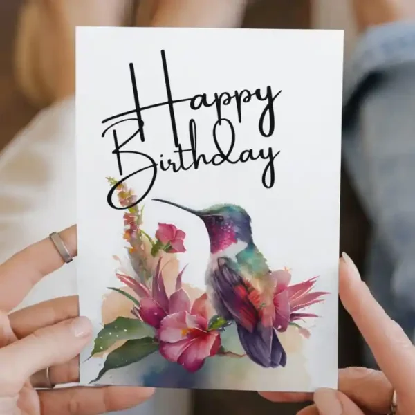 Printable purple hummingbird birthday card featuring watercolor design with flowers. Perfect for celebrating special occasions.