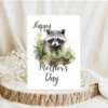 Cute watercolor raccoon on a Mother's Day card, designed with woodland motifs for a heartfelt celebration of moms.