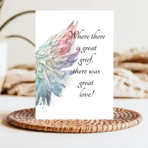 Watercolor angel wings background with the quote about love and grief for a printable sympathy card.