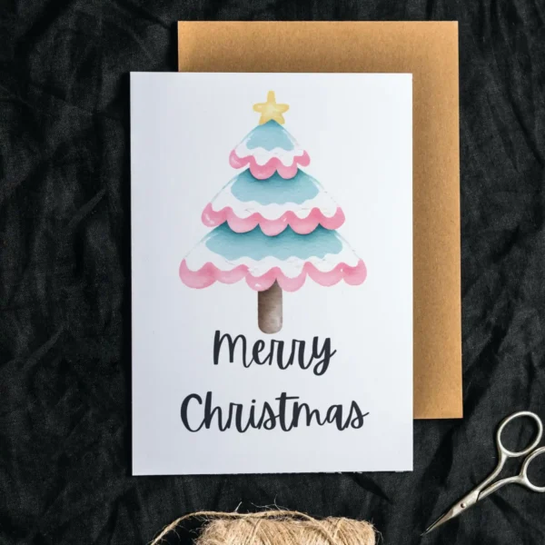 Merry Christmas card displaying a transgender tree in pink, blue and white watercolor, celebrating love and diversity in a festive design.