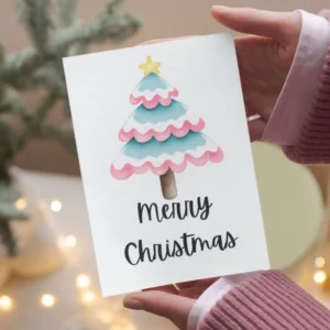 Transgender Printable Christmas card with a pink and blue watercolor tree, embodying a festive and inclusive holiday spirit.