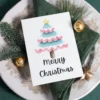 Cheerful transgender Christmas card showcasing a pink and blue watercolor tree, perfect for celebrating diversity this holiday season.