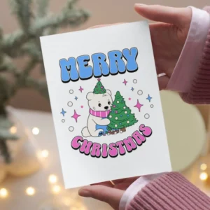 Printable Christmas card featuring a cheerful polar bear with a festive design celebrating Transgender pride.