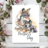 Printable Mother's Day card showcasing a watercolor wolf mother with her pup, radiating happiness and affection.
