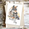 Watercolor artwork of a joyful wolf mom and her pup, designed for a heartfelt Mother's Day greeting card.