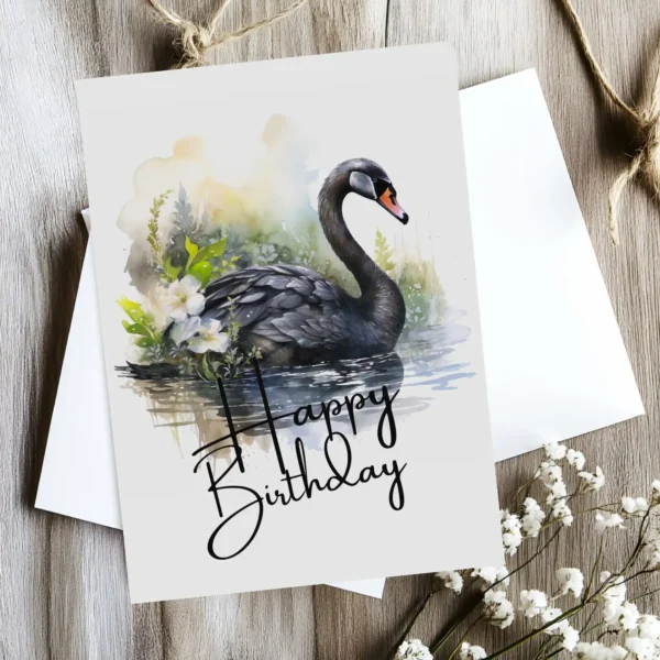Charming birthday card featuring a black swan watercolor design in nature, adorned with a bright "Happy Birthday" message.