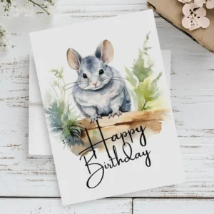 Watercolor birthday card featuring a cheerful chinchilla in a natural setting with a "Happy Birthday" message.