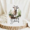 Watercolor goat birthday card depicting a happy goat in nature, complete with a festive "Happy Birthday" text.
