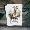 Happy birthday goat card featuring a watercolor illustration of a goat in a serene natural environment.