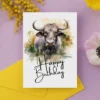 Printable birthday card with a joyful water buffalo illustration and "Happy Birthday" in a colorful watercolor style.