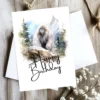 Watercolor Yeti birthday card in a natural setting with a cheerful "Happy Birthday" message. Perfect for a fun celebration!